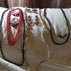 A bundle of seven pieces of  jewelry..